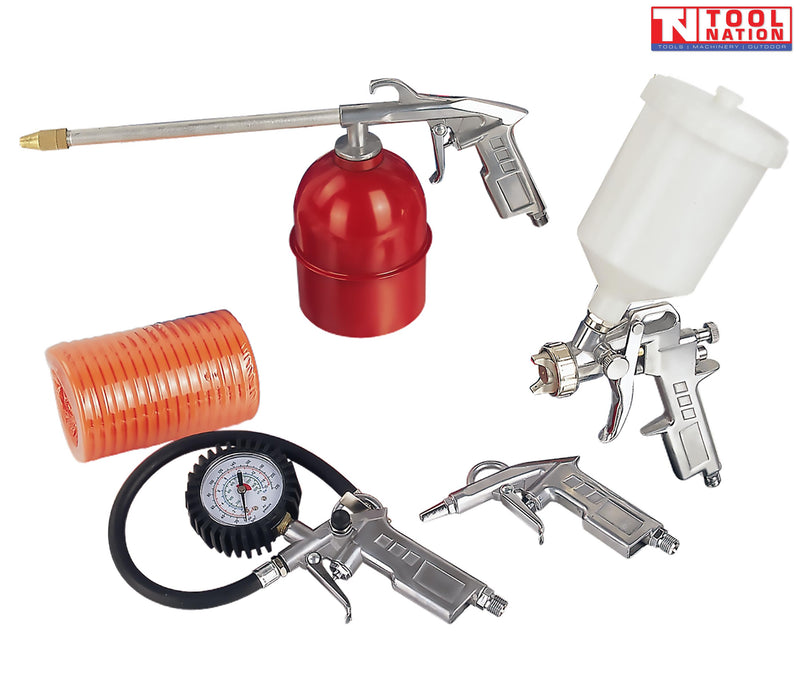 Five-piece air accessory kit with spray gun, cleaning gun, tyre inflator gauge, air blow gun and orange coiled air hose laid out on a white background.
