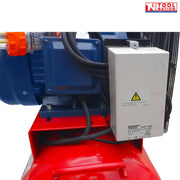 Close-up of the ACB75150E motor starter box and wiring mounted beside the blue motor on the red tank.