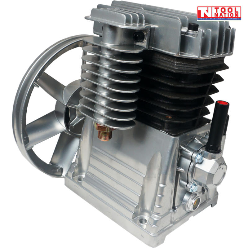 Front angled view of the ACBP2065A air compressor pump showing the two-cylinder V configuration, alloy body, aftercooler tube and large flywheel.