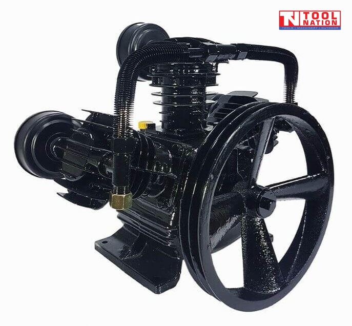 Rear angled view of the ACBPUMP3065 air compressor pump showing the three-cylinder V configuration, black crankcase and large flywheel.