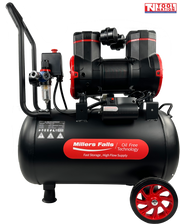 Oil-free air compressor with twin pump units, motor, pressure gauges, handle and wheels on a 35 litre tank.