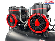 Close-up of the four oil-free pump units mounted on the air compressor tank.