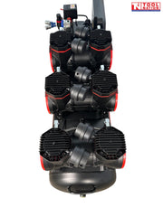 Rear angled view of the oil-free air compressor showing six pump units, three motors, handle, wheels and 100 litre tank.