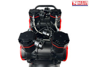 Rear angled view of the oil-free air compressor showing four pump units, dual gauges, handle, wheels and 60 litre tank.