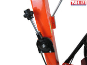 Close-up of an orange plate compactor handle adjustment area with a black knob, metal rod, bolts, and warning label.