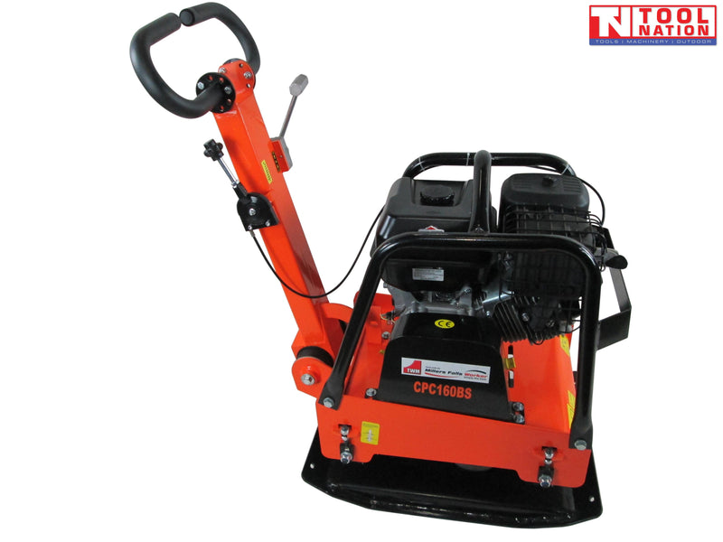 Orange plate compactor with black base plate, petrol engine, protective frame, handle, controls, warning labels, and logo in the top corner.