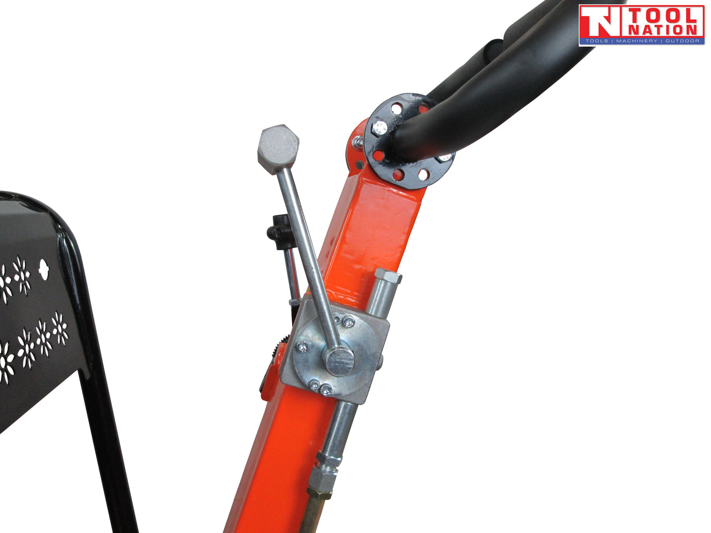 Close-up of an orange plate compactor handle with black grip, metal control lever, bolts, cable, and logo in the top corner.