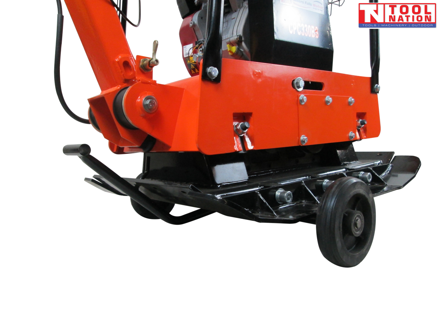 Close-up rear view of an orange plate compactor with black base plate, wheel kit, handle hinge, bolts, control lever, and logo in the top corner.