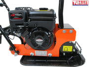 Close-up side view of an orange plate compactor showing the petrol engine, base plate, protective frame, bolts, and warning labels.