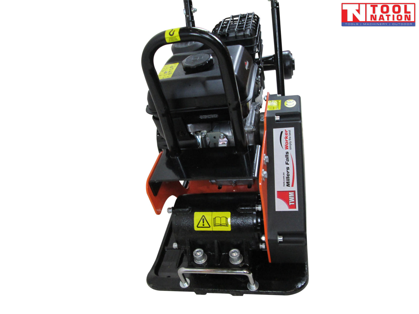 Front view of an orange plate compactor showing the petrol engine, black belt cover, base plate, protective frame, warning labels, and logo in the top corner.