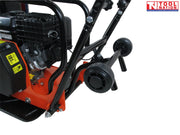 Close-up rear view of an orange plate compactor showing the petrol engine, handle frame, wheel kit, black belt cover, bolts, and logo in the top corner.
