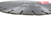 Low close-up of a silver segmented diamond cutting blade showing the segmented cutting edge, centre holes, faint printed text, and logo in the top corner.