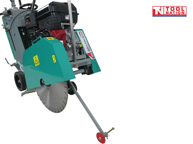 Front angled view of a teal and grey floor saw with petrol engine, blade guard, diamond blade, wheels, and pointer arm.