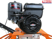 Close-up of a petrol engine mounted on an orange power trowel with handle section, bolts, and circular guard edge visible.