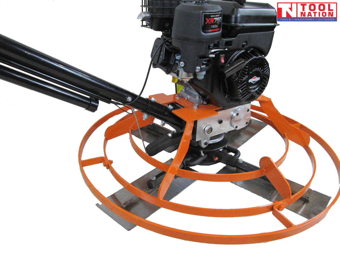Close-up angled view of an orange power trowel showing the petrol engine, black handle, circular guard ring, and metal blades.