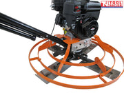 Close-up angled view of an orange power trowel showing the petrol engine, black handle, circular guard ring, and metal blades.