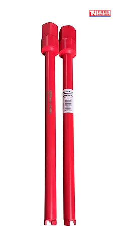 Red diamond core drill bit with a side label, top connector, segmented metal cutting teeth, and logo in the top corner.