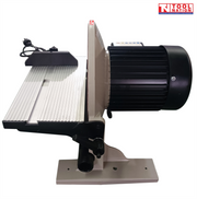 Side view of a bench disc sander with silver work table, black motor housing, power cord, tilt handle, and logo in the top corner.