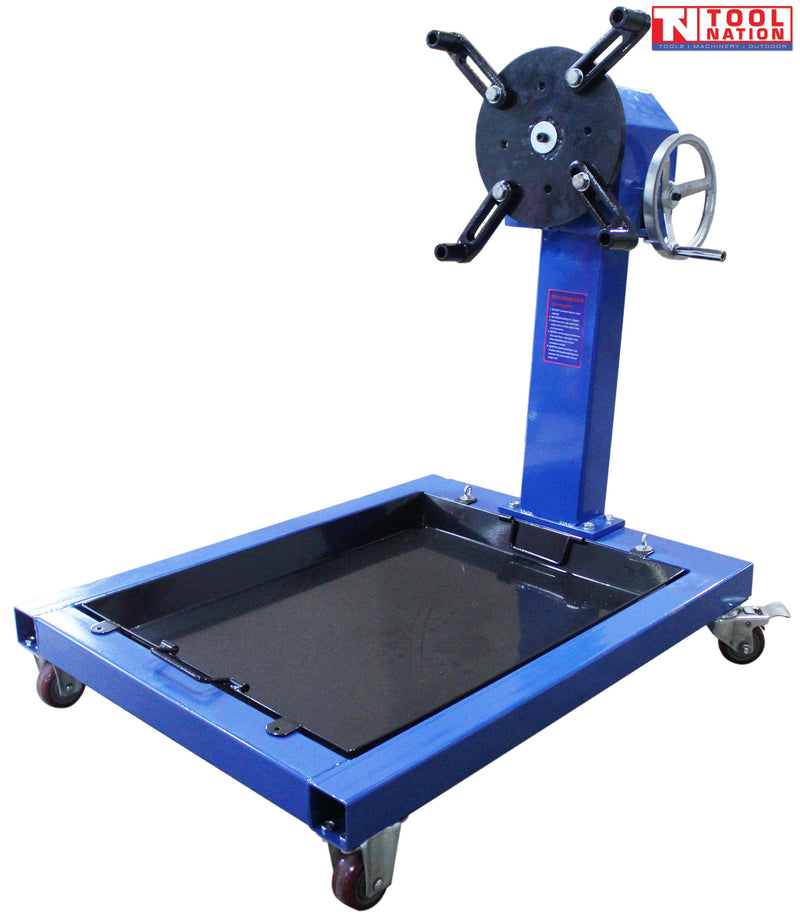 Engine stand with oil pan angled view, blue frame, black mounting head, hand wheel, and casters
