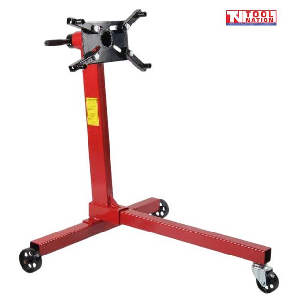 Engine stand front angled view with red frame, black mounting head, handle, and casters