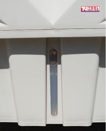 Close-up of the water level window on the lower front panel.