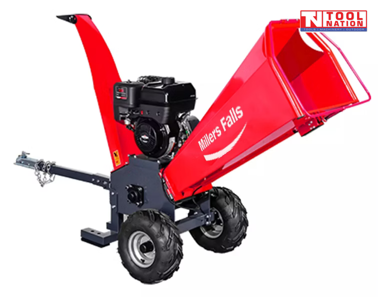 Red chipper shredder with a black engine, large feed chute, discharge chute, tow bar, two tyres and Tool Nation logo.