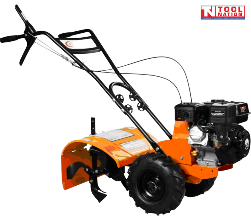 Orange tiller shown from the side with black handles, black engine, front tine cover, visible tines and two large treaded wheels.