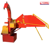 Red and yellow wood chipper with a feed hopper, curved discharge chute, support stand, and logo in the top right corner.