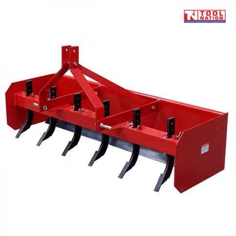 Red box grader attachment with black ripper tines, triangular mounting frame, pins, bolts, and a logo in the top right corner.