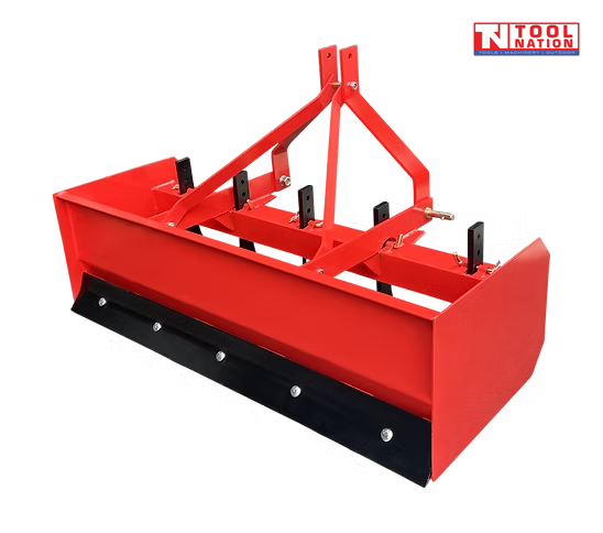Rear angled view of a red box grader attachment with black cutting edge, triangular mounting frame, pins, bolts, and a logo in the top right corner.