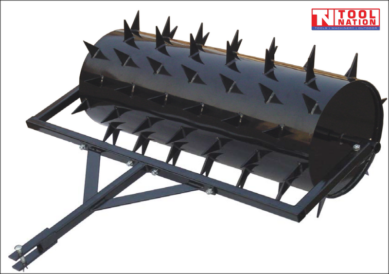 Black towable spiked roller with a rectangular frame, drawbar, metal pin and Tool Nation logo.