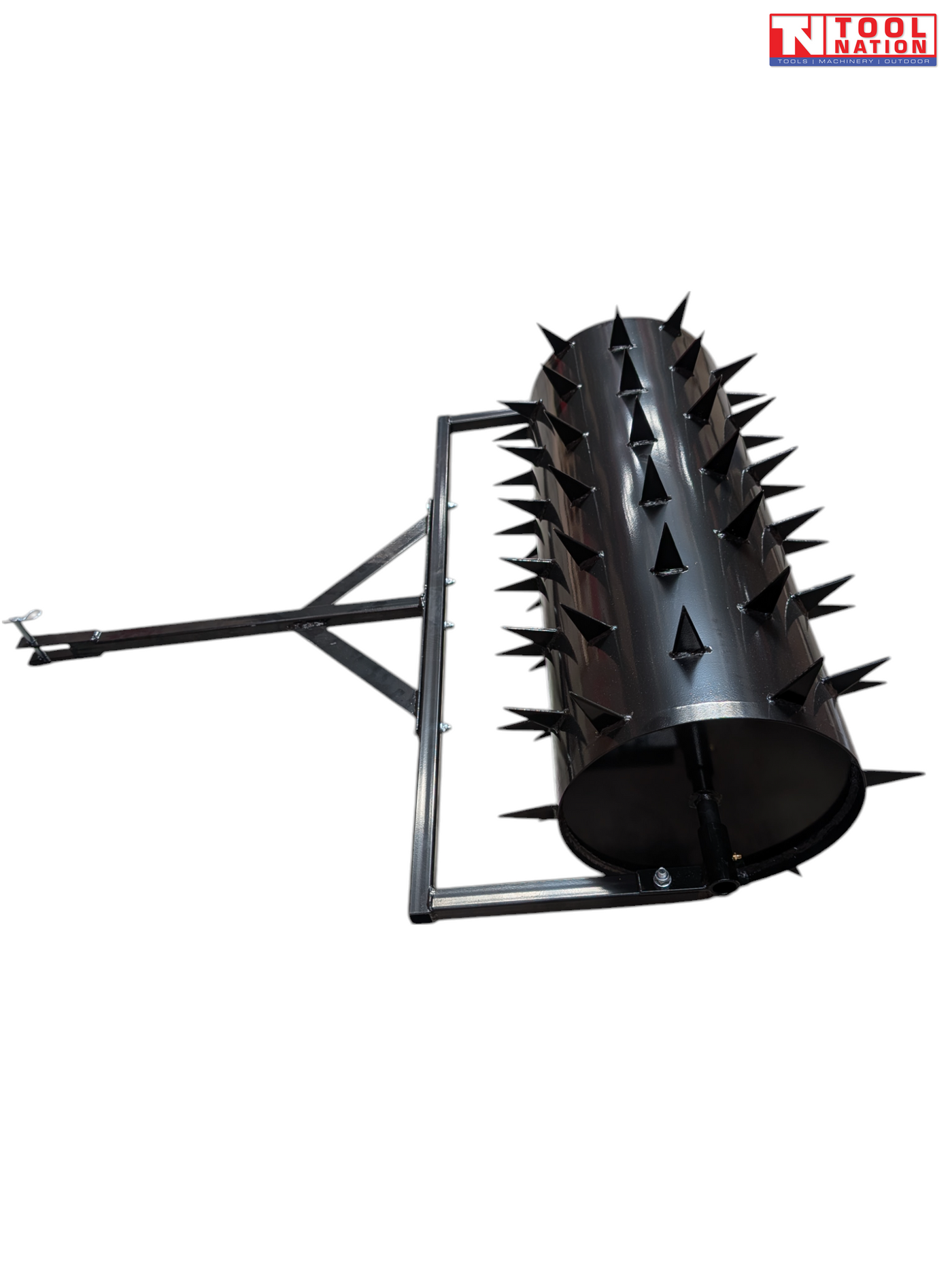 Black towable spiked roller shown from the end with a rectangular frame and drawbar on a white background.