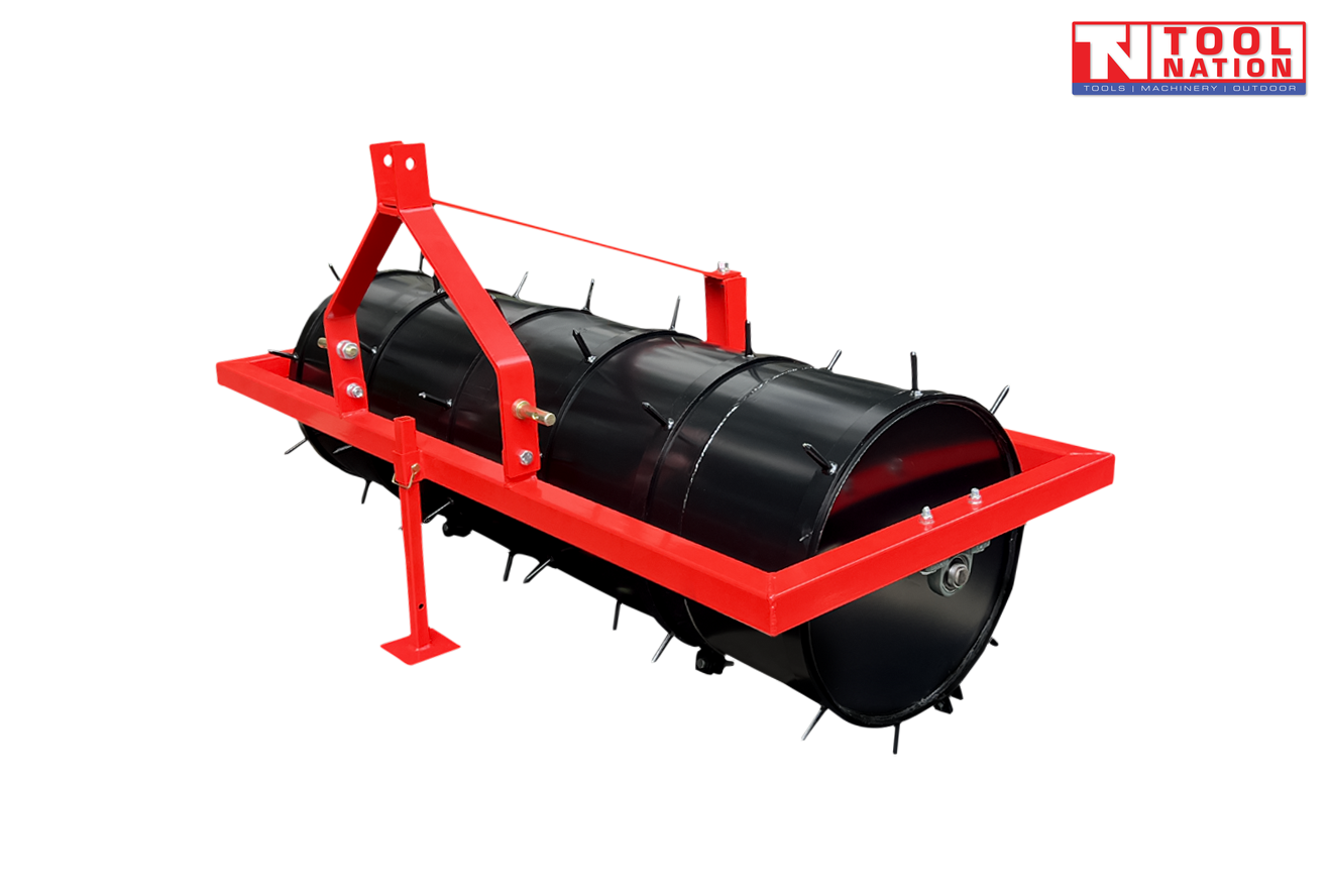 Red and black spiked roller attachment with triangular mounting frame, support leg, bolts, pins, and a logo in the top right corner.