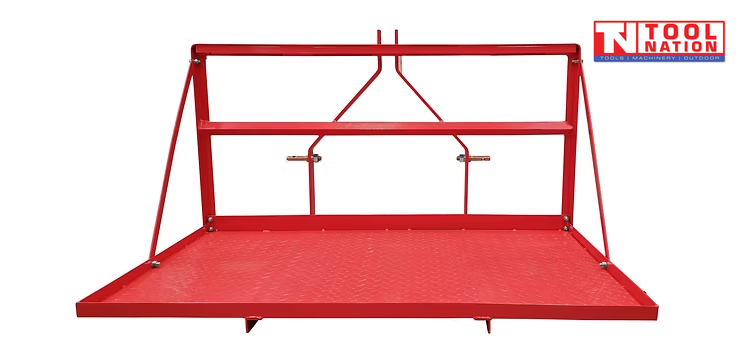 Red carry-all platform with a textured floor, raised frame, triangular side supports, mounting pins, and a logo in the top right corner.