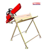 Metal saw bench with angled legs, a V-shaped tray, a red chainsaw and a red cover attached at one end.