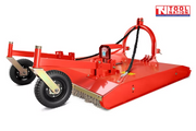Red slasher attachment with two rear wheels, curved mounting frame, black cable, chains, and a logo in the top right corner.