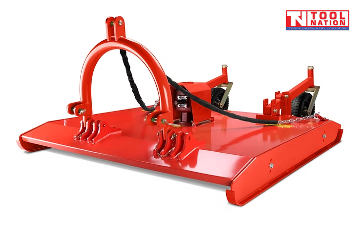 Rear angled view of a red slasher attachment with curved mounting frame, black cable, two rear wheels, chains, and a logo in the top right corner.