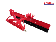 Red grader blade attachment viewed from an angle, showing a triangular mounting frame, black lower blade edge, bolts, pins, and a logo in the top right corner.