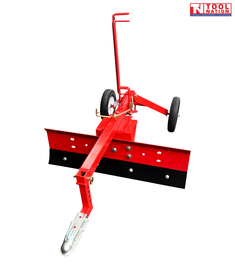 Red towable grader blade shown from the front with a long drawbar, metal coupler, two tyres, upright handle and Tool Nation logo.