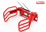 Red bale gripper with two curved gripping arms, rectangular mounting frame, hydraulic hoses, and a logo in the top right corner.