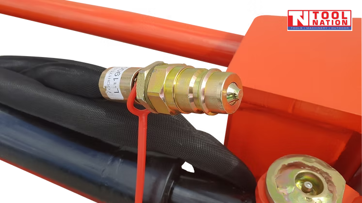 Close-up of a hydraulic hose coupling, black hose, red frame, and logo in the top right corner.