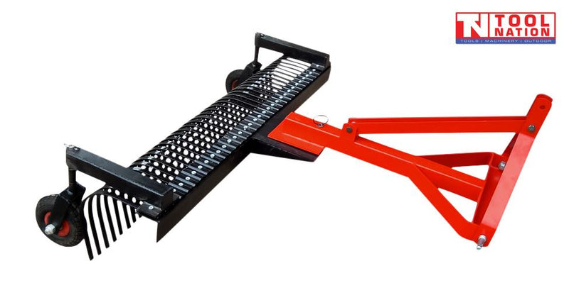 Red and black landscape rake attachment with curved rake tines, triangular mounting frame, two wheels, bolts, and a logo in the top right corner.