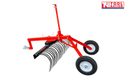 Red towable landscape rake shown from the side with black curved tines, long drawbar, metal coupler, two tyres and Tool Nation logo.