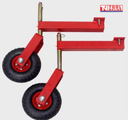 Pair of red wheel kit assemblies with black wheels, red brackets, gold-coloured shafts, bolts, and a logo in the top right corner.