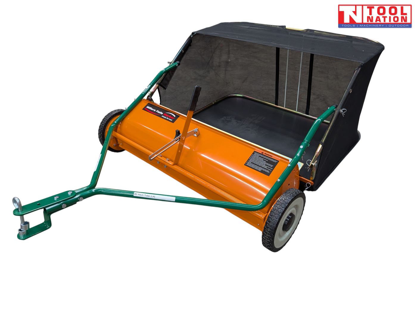 Orange and green towable lawn sweeper shown from the front side with a black mesh collection bag, drawbar, two tyres and Tool Nation logo.