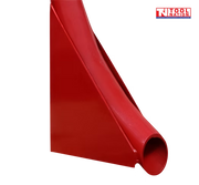 Close-up of the curved lower tube opening on a red metal attachment, with a logo in the top right corner.