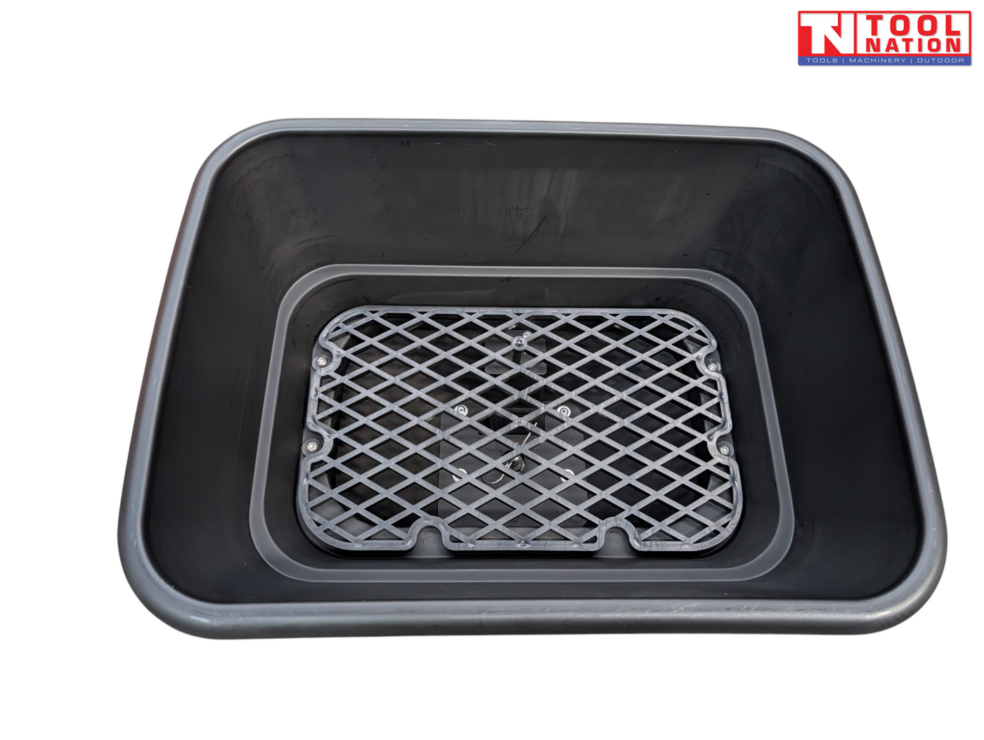 Top view inside a black spreader hopper showing a grey mesh screen fitted at the base.