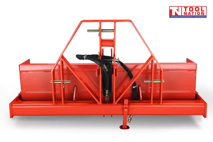 Rear view of a red bucket attachment with triangular mounting frame, black hydraulic hoses, pins, and support leg, with a logo in the top right corner.