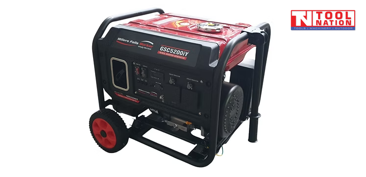 Front three-quarter view of the GSC5200iY inverter generator showing the red fuel tank, black protective frame, control panel and wheels.