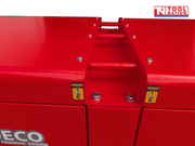 Close-up of the top lifting point on the red generator housing, with warning labels on both sides.